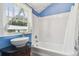 Charming bathroom with a clawfoot tub and updated vanity at 301 Old Hopewell Rd, Plant City, FL 33567