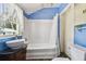 Updated bathroom features a pedestal sink, bathtub, and shower at 301 Old Hopewell Rd, Plant City, FL 33567