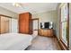Bright bedroom with wood floors and built-ins at 301 Old Hopewell Rd, Plant City, FL 33567