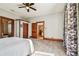 Bright bedroom with carpet flooring and ample natural light at 301 Old Hopewell Rd, Plant City, FL 33567