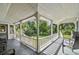 Wrap around porch with white railings and backyard view at 301 Old Hopewell Rd, Plant City, FL 33567