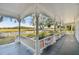 Spacious wrap-around porch overlooking a large backyard at 301 Old Hopewell Rd, Plant City, FL 33567
