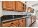 Renovated kitchen with granite countertops and wood cabinets at 301 Old Hopewell Rd, Plant City, FL 33567