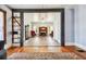 Open living room with hardwood floors and a fireplace at 301 Old Hopewell Rd, Plant City, FL 33567