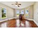 Sunlit office with hardwood floors and built-in desk at 301 Old Hopewell Rd, Plant City, FL 33567