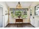 Charming sunroom with a window seat and wood floors at 301 Old Hopewell Rd, Plant City, FL 33567