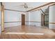Bright bedroom featuring light wood floors and ceiling fan at 35934 Verano Ln, Zephyrhills, FL 33541
