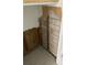 Unfinished basement area with exposed brick wall at 404 13Th Sw St, Ruskin, FL 33570