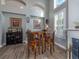 Breakfast nook with a small table and chairs near the fireplace at 4709 Corsage Dr, Lutz, FL 33558