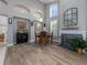 Charming breakfast nook with a table and chairs, adjacent to a fireplace at 4709 Corsage Dr, Lutz, FL 33558