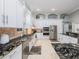 Spacious kitchen with granite countertops and stainless steel appliances at 4709 Corsage Dr, Lutz, FL 33558