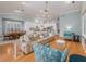 Large living room with hardwood floors and ample natural light at 4709 Corsage Dr, Lutz, FL 33558