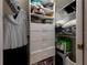 Large walk-in closet with ample shelving and drawers at 4709 Corsage Dr, Lutz, FL 33558