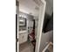 Clean bathroom, granite countertop, white cabinets, and a shower/tub combo at 4841 Zodiac Ave, Holiday, FL 34690