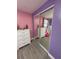 bedroom with mirrored closet doors and white dresser at 4841 Zodiac Ave, Holiday, FL 34690