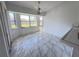 Breakfast nook with tile floors and a large window overlooking the backyard at 491 Allworthy St, Port Charlotte, FL 33954