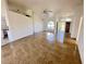 Open living room with tile floors and access to the backyard at 491 Allworthy St, Port Charlotte, FL 33954