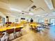 Community room with tables, chairs, and a relaxing atmosphere at 4910 Bay Ne St # 103, St Petersburg, FL 33703