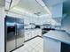 Kitchen boasts stainless steel appliances and ample cabinet space at 4910 Bay Ne St # 103, St Petersburg, FL 33703