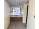 Bathroom with vanity, mirror, and tiled flooring at 10 Golfview S Rd, Rotonda West, FL 33947