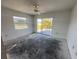 Empty bedroom with sliding doors to patio at 10 Golfview S Rd, Rotonda West, FL 33947