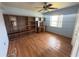 Bedroom with wood flooring and built-in shelves at 10 Golfview S Rd, Rotonda West, FL 33947