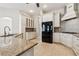 Modern kitchen with granite countertops and island at 10325 Millport Dr, Tampa, FL 33626