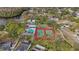 Aerial view of community amenities including pool, tennis courts, and basketball court at 106 Edgewood Ct, Oldsmar, FL 34677