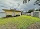 Backyard with shed and additional building at 10908 W Elbow Dr, Tampa, FL 33612