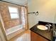 Bathroom with tub, shower, and granite vanity at 10908 W Elbow Dr, Tampa, FL 33612