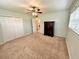 Bright bedroom with carpet flooring, double door closet and ceiling fan at 10908 W Elbow Dr, Tampa, FL 33612