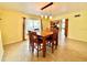 Bright dining room with wood table and chairs at 10908 W Elbow Dr, Tampa, FL 33612