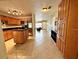 Kitchen with island, wood cabinets, and stainless steel appliances at 10908 W Elbow Dr, Tampa, FL 33612
