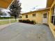 Nice patio area with view of the backyard and white fence at 10908 W Elbow Dr, Tampa, FL 33612