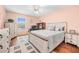 Comfortable bedroom with a queen-size bed and ample closet space at 1122 84Th N Ter # C, St Petersburg, FL 33702
