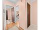 Neutral-toned hallway with access to multiple rooms at 1122 84Th N Ter # C, St Petersburg, FL 33702