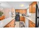 Modern kitchen with ample counter space and stainless steel appliances at 1122 84Th N Ter # C, St Petersburg, FL 33702