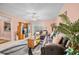 Living room with leather sofas, coffee table, and large TV at 1122 84Th N Ter # C, St Petersburg, FL 33702