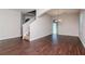 Spacious dining area with hardwood floors and chandelier, access to back patio at 13167 Royal Pines Ave, Riverview, FL 33579