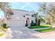 Two-story house with red door, attached garage, and landscaped lawn at 13167 Royal Pines Ave, Riverview, FL 33579