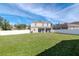 House exterior view with fenced backyard at 13167 Royal Pines Ave, Riverview, FL 33579