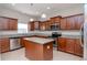 Modern kitchen with granite countertops and island at 13167 Royal Pines Ave, Riverview, FL 33579