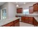 Bright kitchen with granite countertops and ample cabinetry at 13167 Royal Pines Ave, Riverview, FL 33579