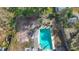 Aerial view showcasing a refreshing pool in a spacious backyard at 1517 Young Ave, Clearwater, FL 33756