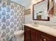 Bathroom with a shower/tub combo and wood vanity at 1517 Young Ave, Clearwater, FL 33756