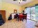 Dining area with fireplace and pool view at 1517 Young Ave, Clearwater, FL 33756