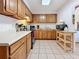 Kitchen with wood cabinets and appliances at 1517 Young Ave, Clearwater, FL 33756