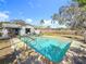Clean lines, refreshing pool, and backyard view at 1517 Young Ave, Clearwater, FL 33756