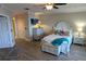 Spacious main bedroom with king bed and wood floors at 1614 Point Pleasant W Ave, Bradenton, FL 34205