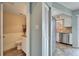 Small half bathroom with updated fixtures at 17960 Gulf Blvd # 123, Redington Shores, FL 33708